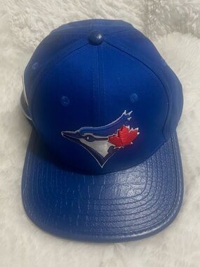 Royal Blue Baseball Cap with Red Maple Leaf Logo